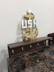 This shelf is 2ft by 8in wide and the anchor is 18 inches tall. $200.00 plus shipping.